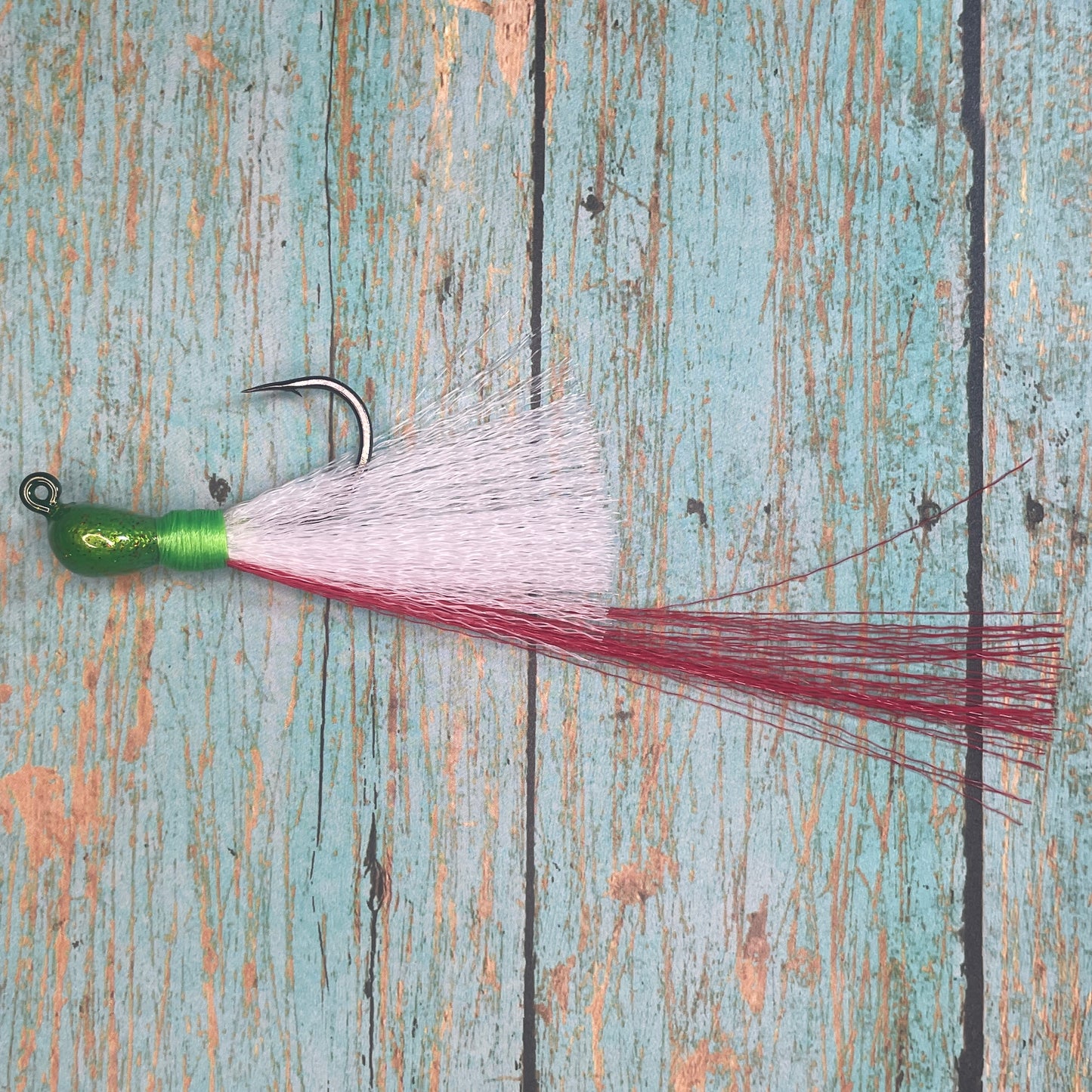 Mini Flare Hawk Jig. Peacock and Snook Candy