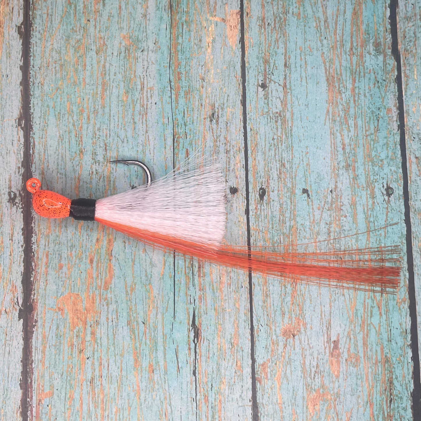 Mini Flare Hawk Jig. Peacock and Snook Candy