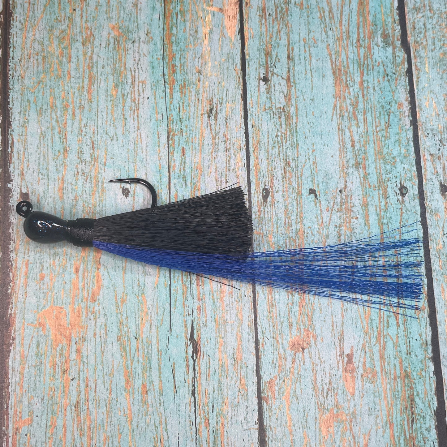 Mini Flare Hawk Jig. Peacock and Snook Candy