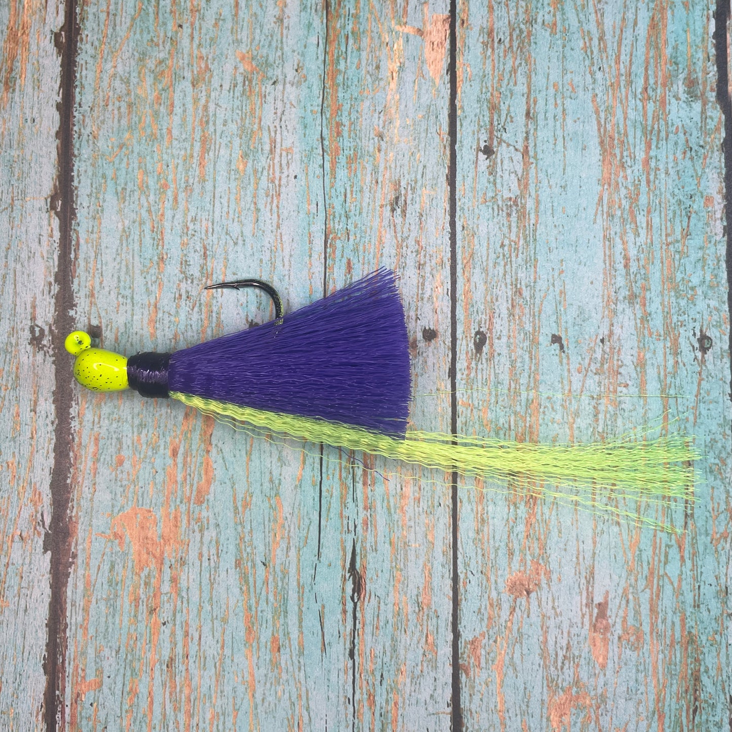 Mini Flare Hawk Jig. Peacock and Snook Candy