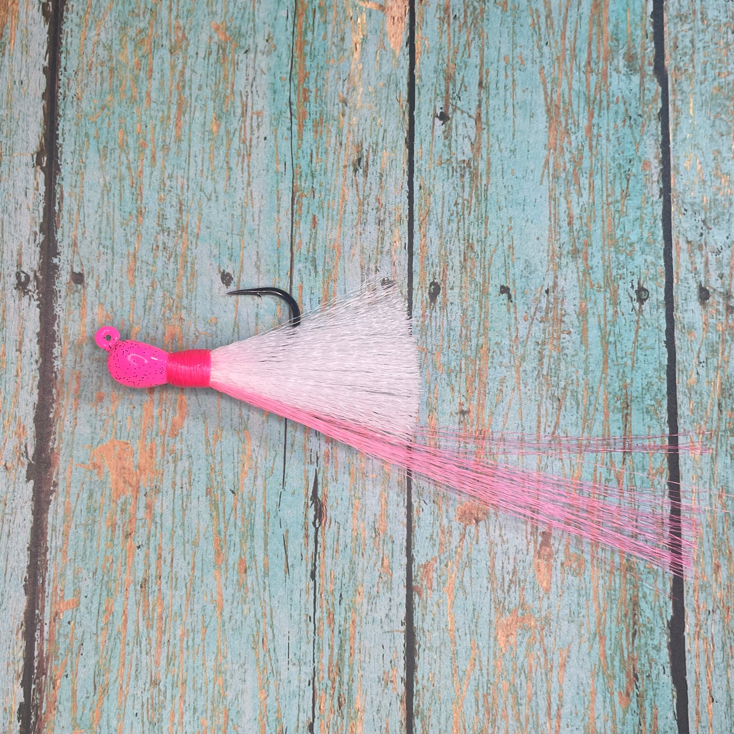 Mini Flare Hawk Jig. Peacock and Snook Candy