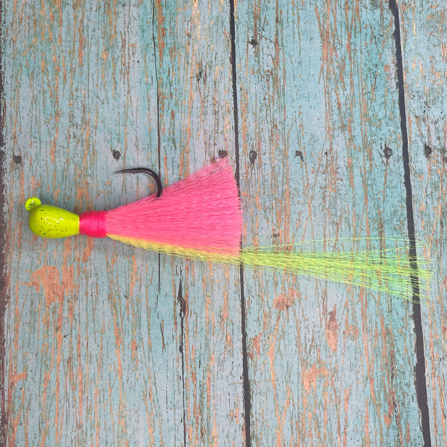 Mini Flare Hawk Jig. Peacock and Snook Candy