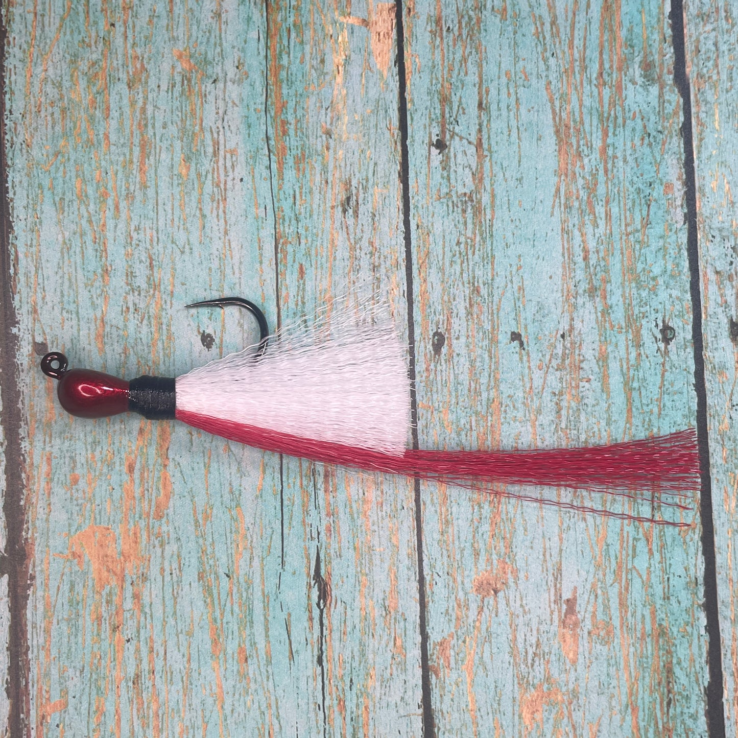 Mini Flare Hawk Jig. Peacock and Snook Candy