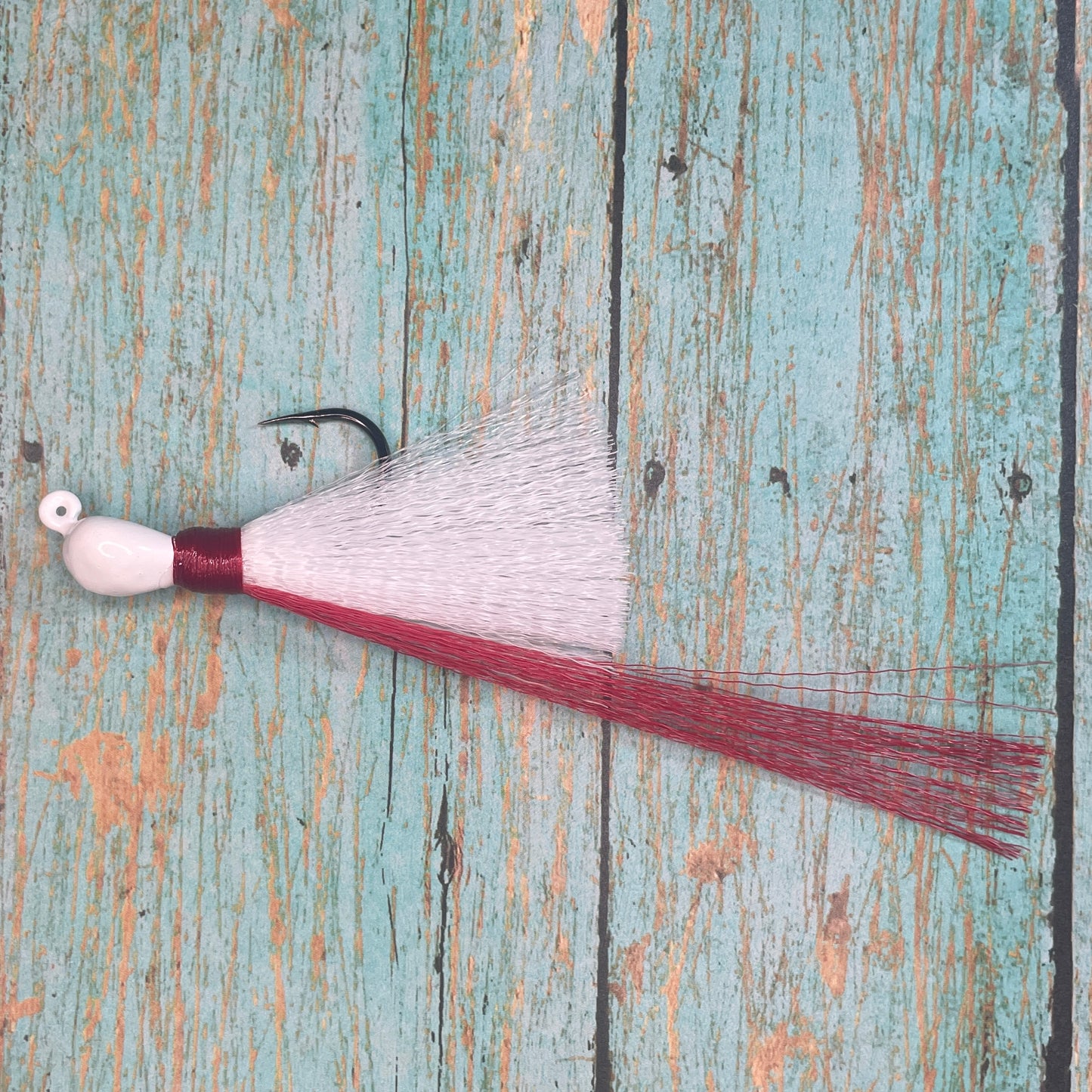 Mini Flare Hawk Jig. Peacock and Snook Candy