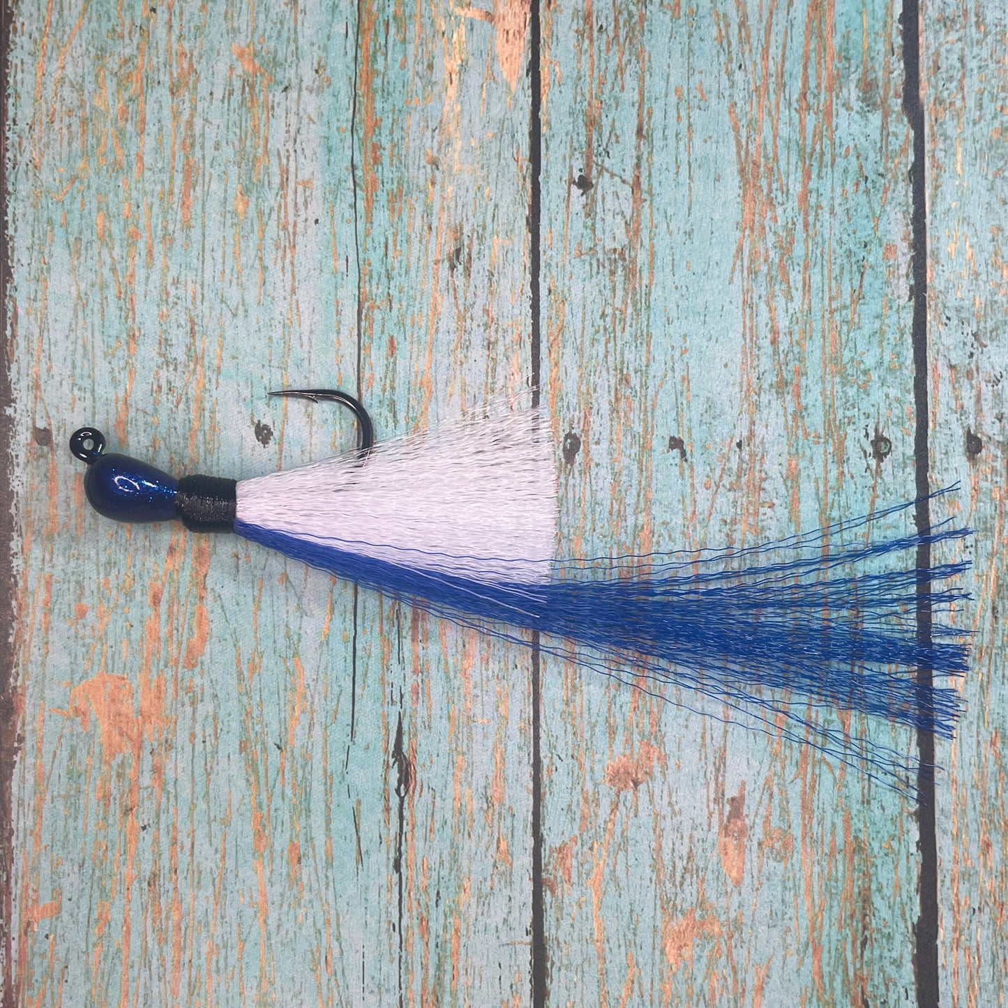 Mini Flare Hawk Jig. Peacock and Snook Candy