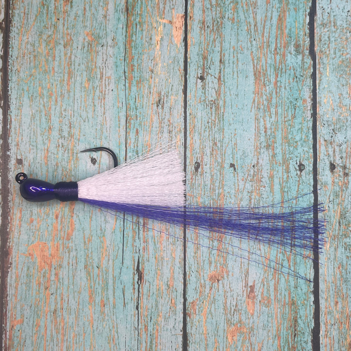 Mini Flare Hawk Jig. Peacock and Snook Candy