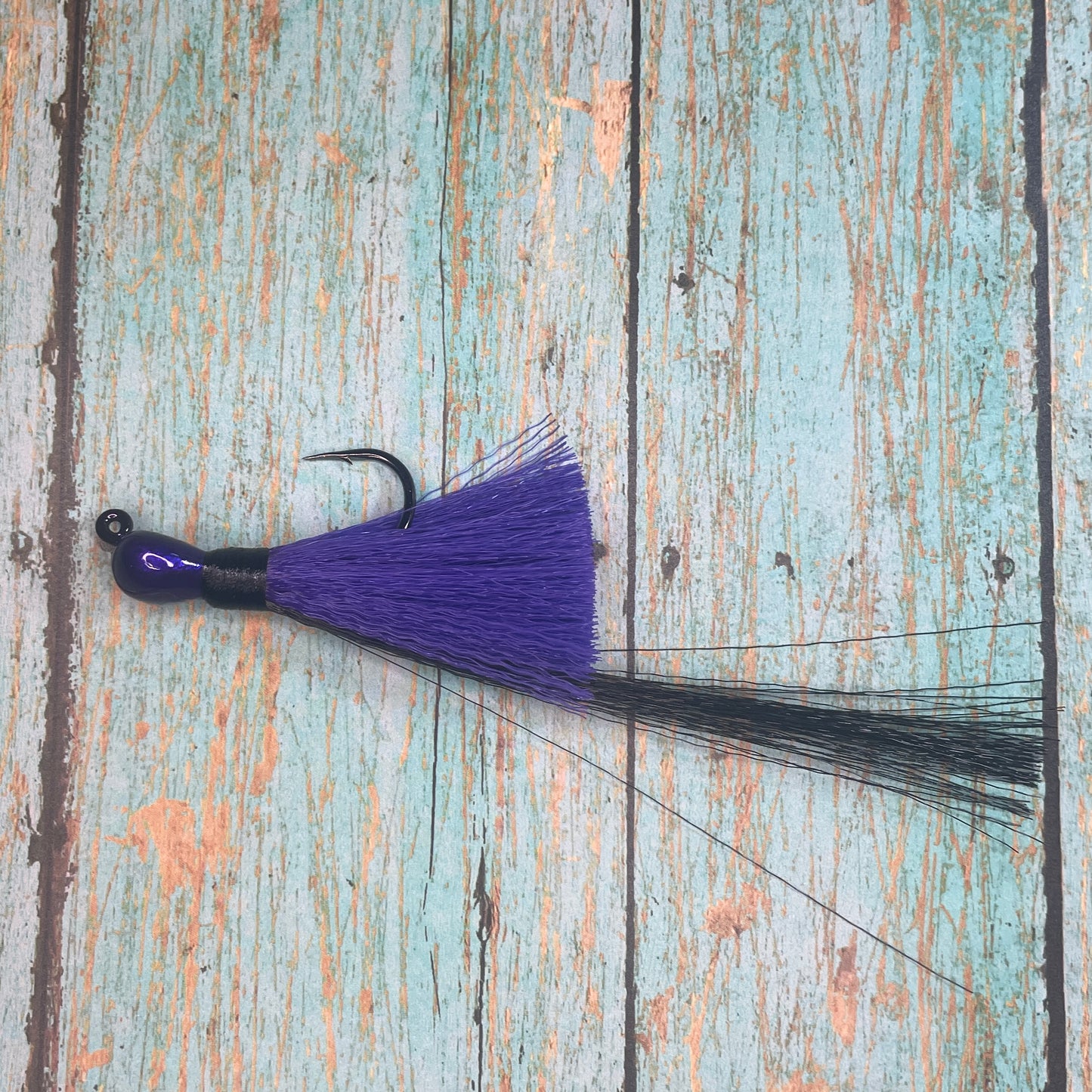 Mini Flare Hawk Jig. Peacock and Snook Candy